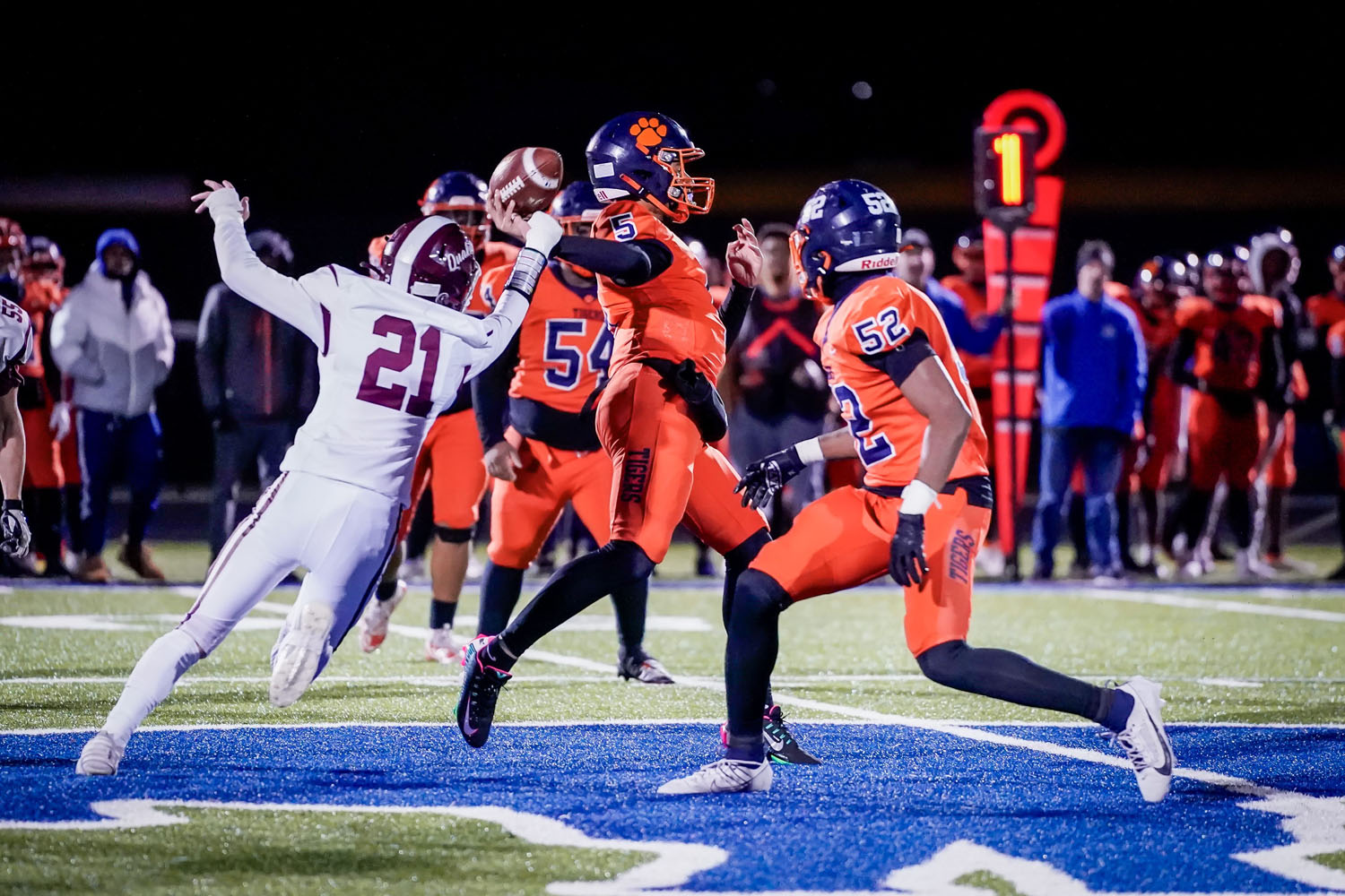 OP defender grabbing the ball from the Bennett QB