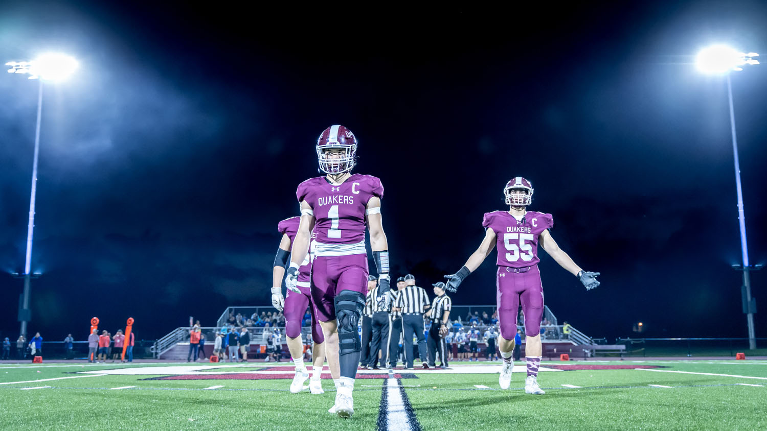 Captains coming off the field from the coin toss