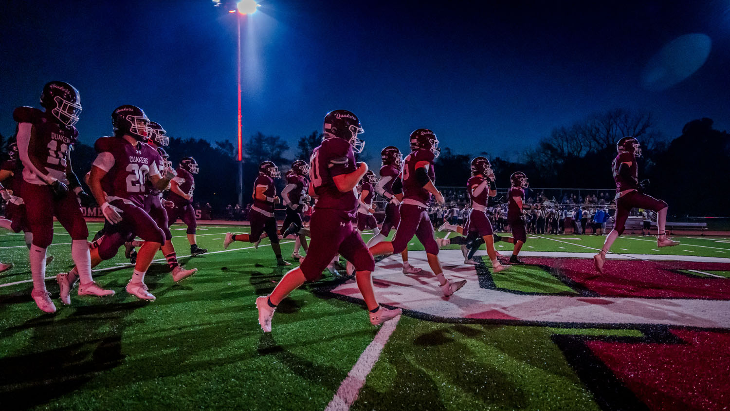 Orchard Park running onto the field