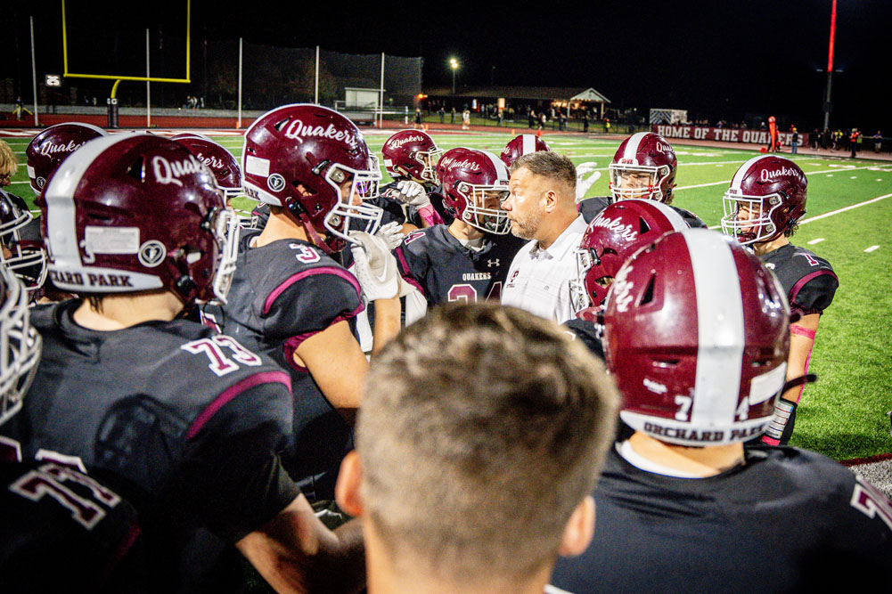 Coach talking to his squad during a timeout