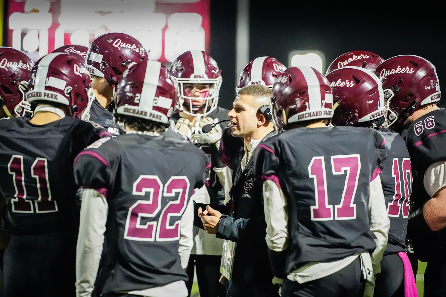 Coach talking to his team during a timeout