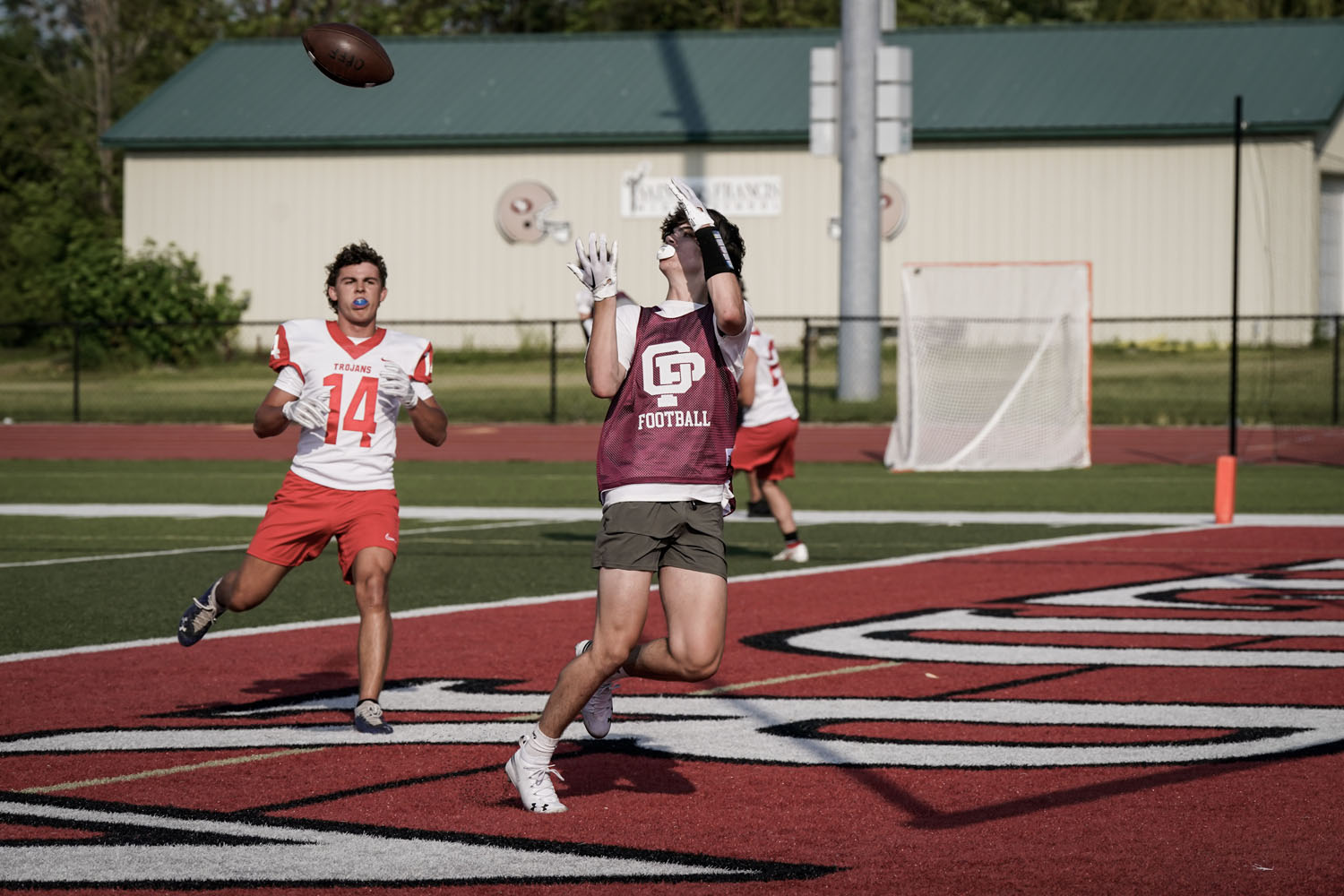 Receiver in the endzone about to make the catch