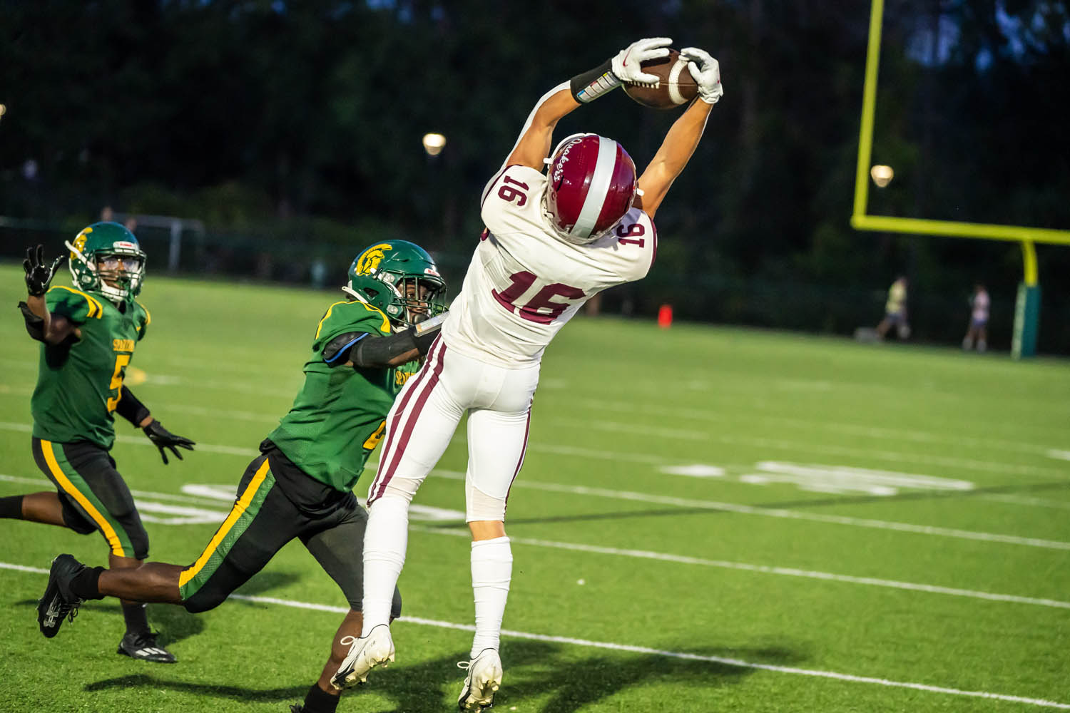 WR going up for the catch