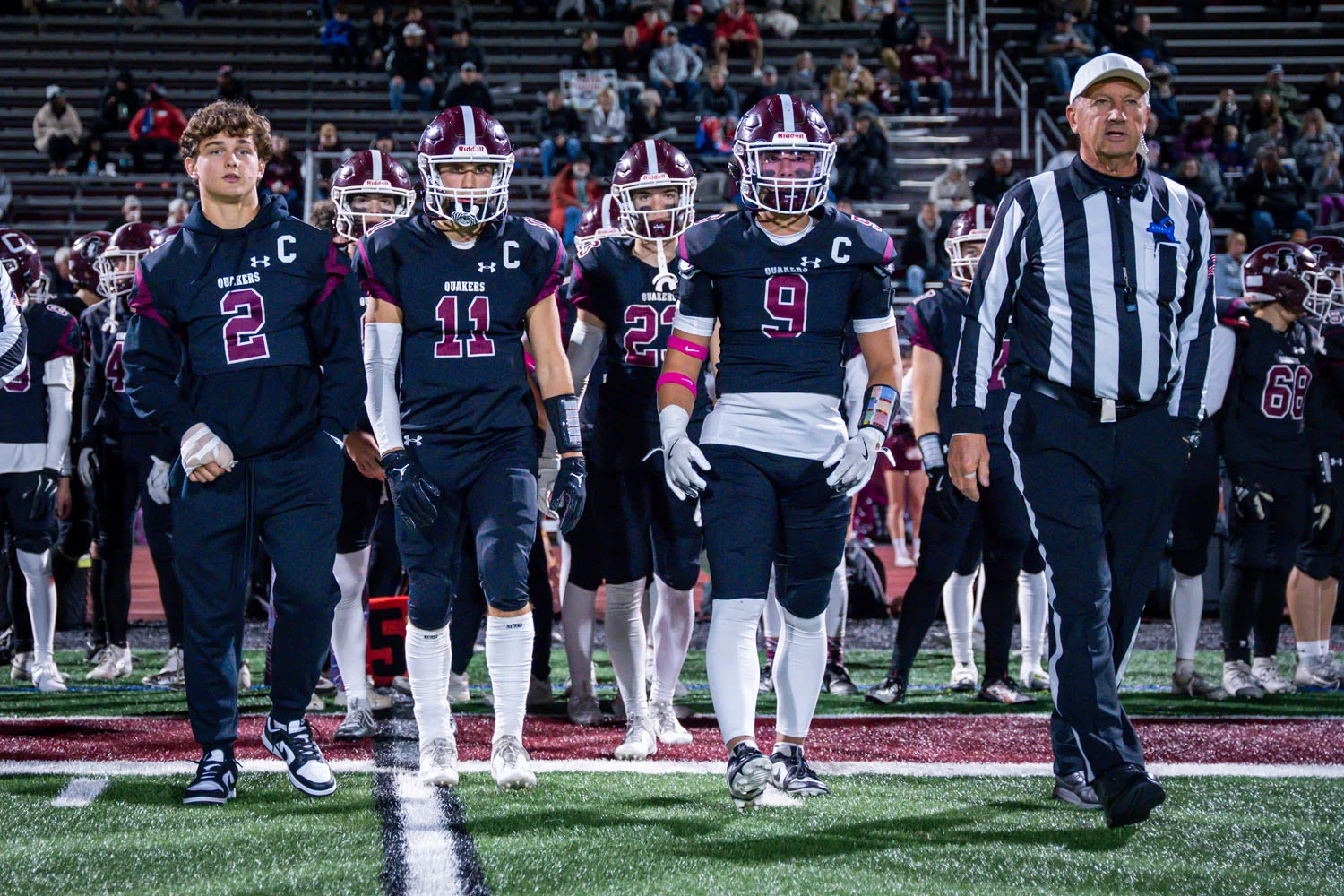 Captians headed to the coin toss