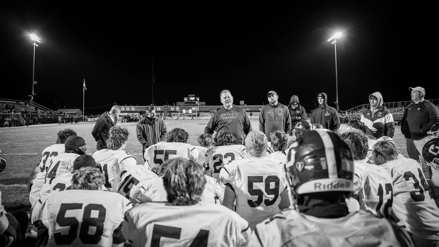 Coach talking to the team after the game