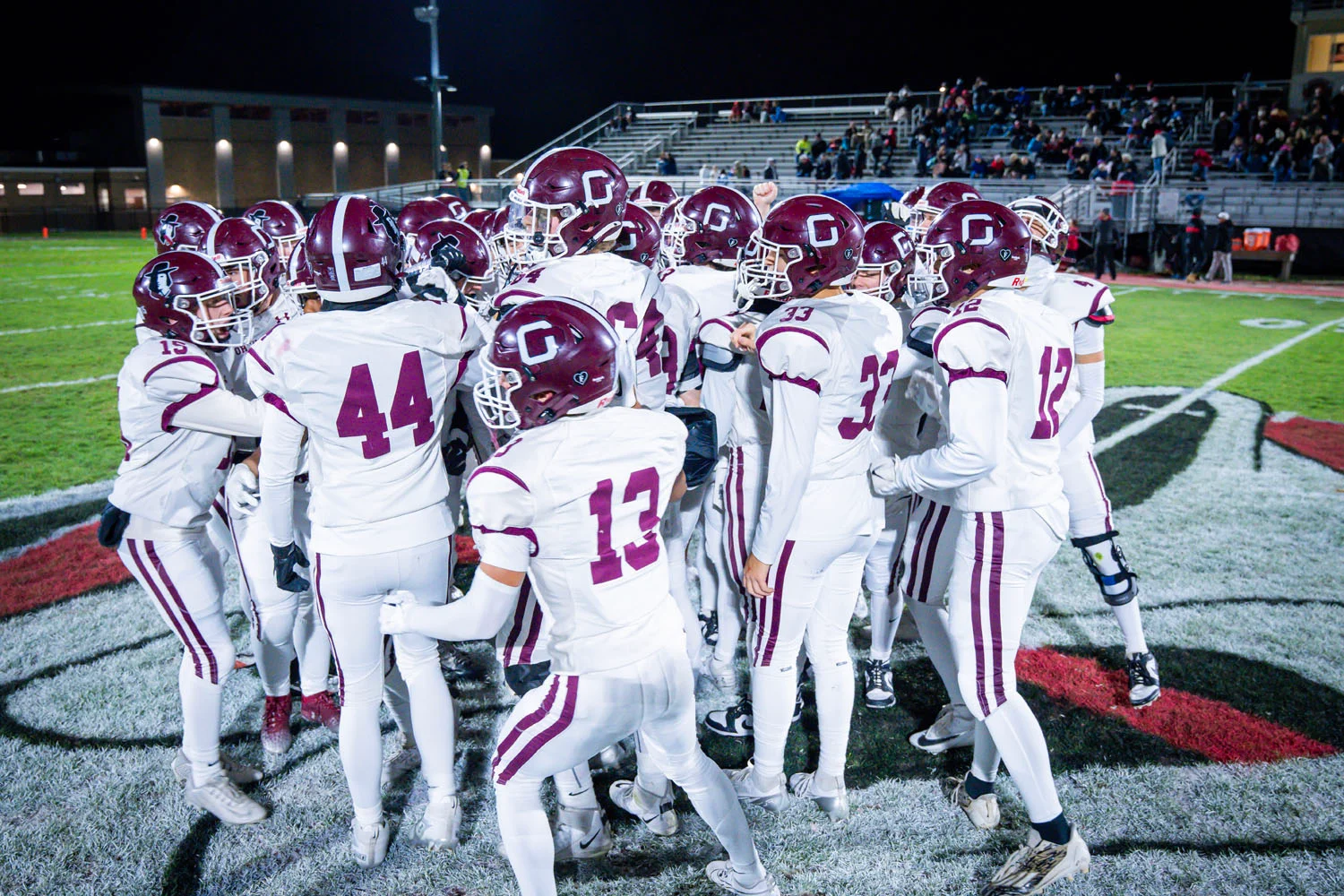 Pregame huddle at midfield