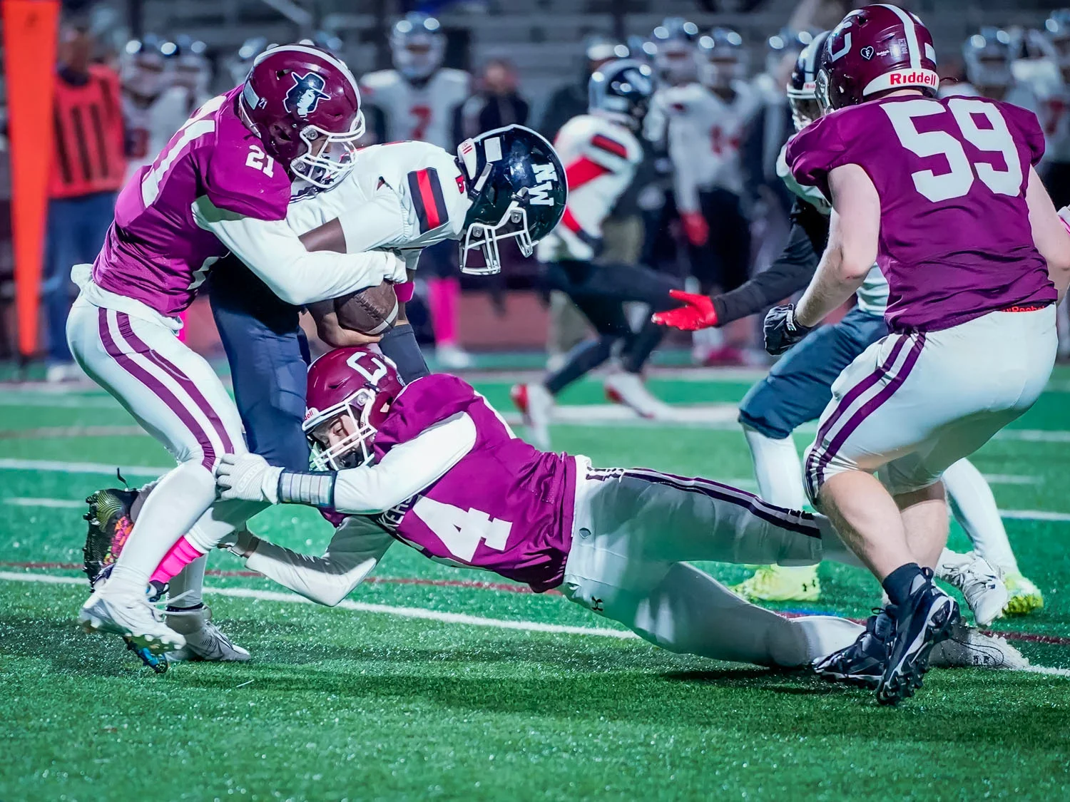 Gang tackle against Niagara Wheatfield