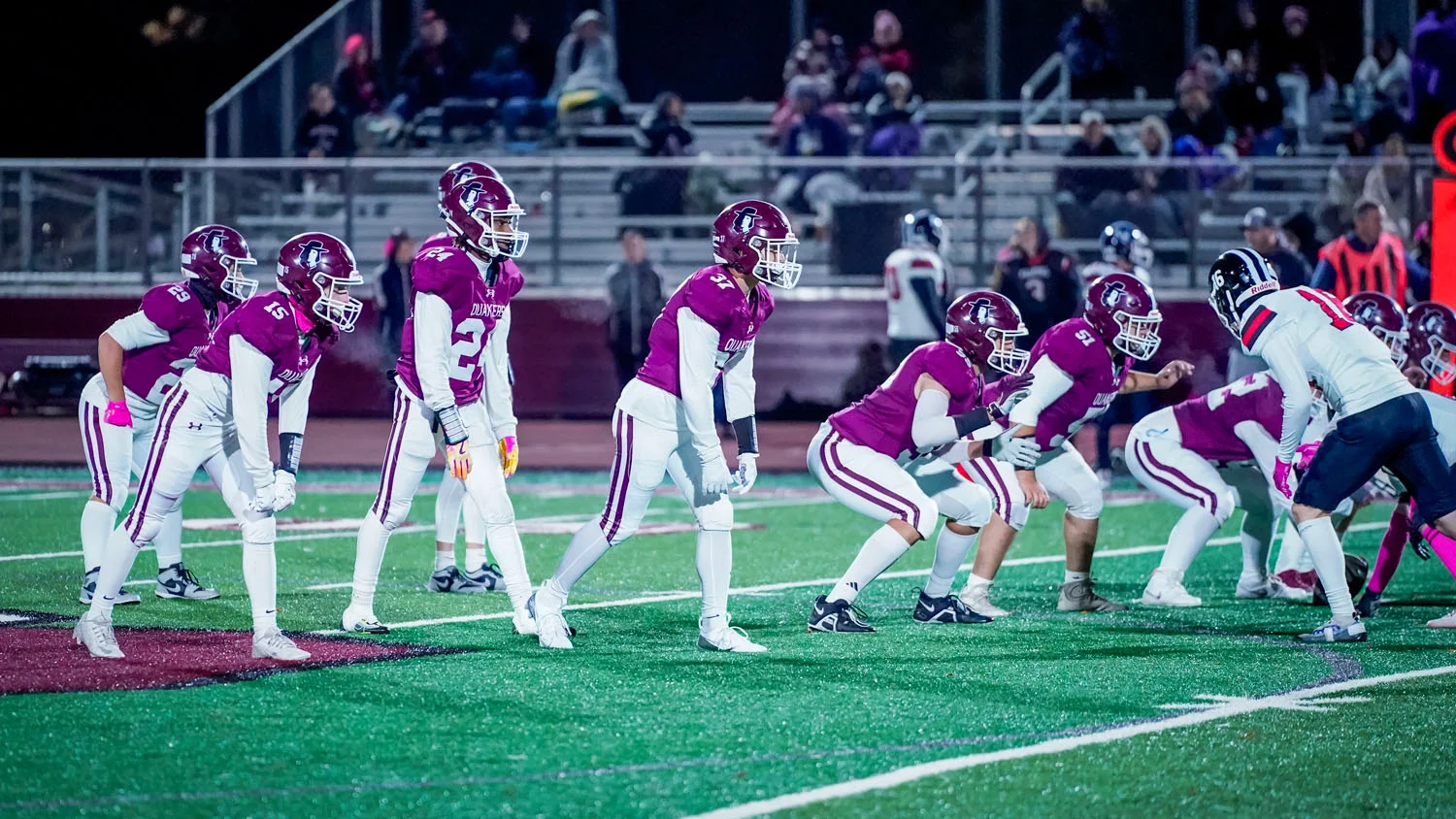 Offense players set for the play