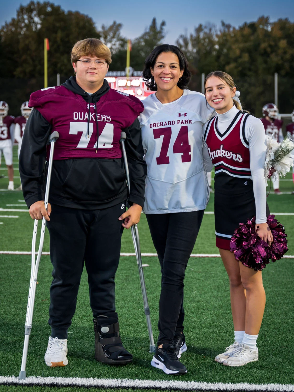 Teacher and player on Senior Night