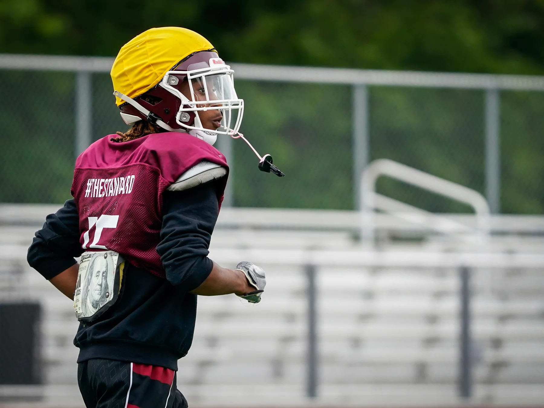 Orchard Park player running back to the huddle