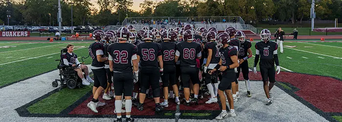 Orchard Park Quaker Pregame huddle