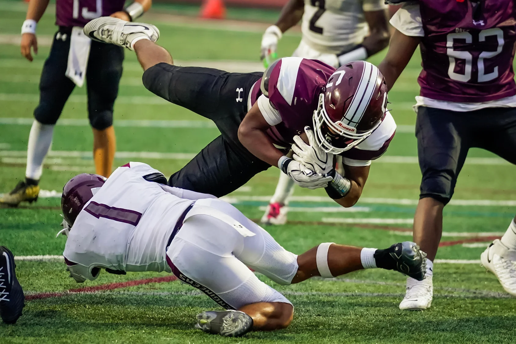 RB diving for more yards against Hutch Tech