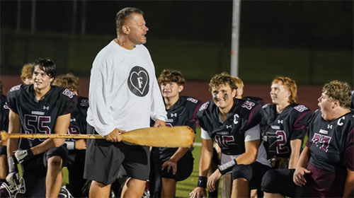 Head Coach Cieslik talking to his team